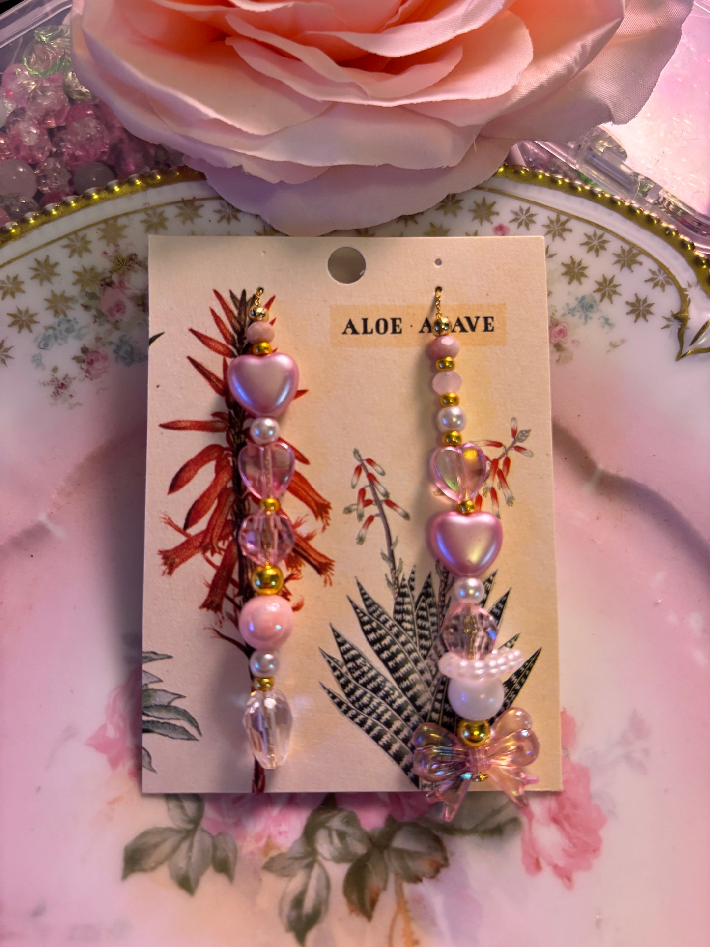 Coquette mismatched earrings