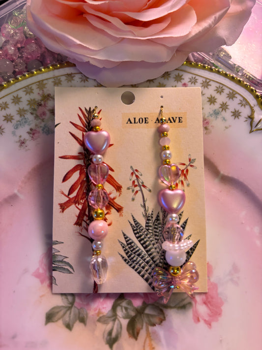 Coquette mismatched earrings